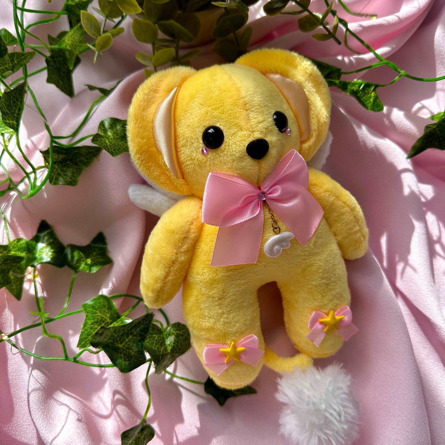 Peluche Kerobero Kero Sakura Cardcaptor avec pendentif aile et nœud rose