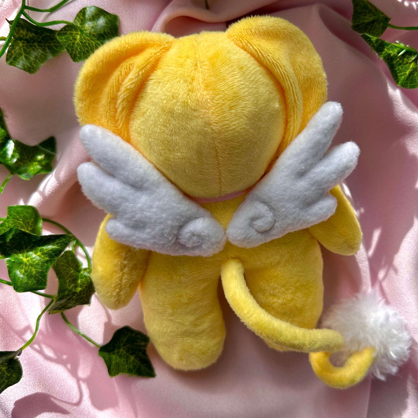 Peluche Kerobero Kero Sakura Cardcaptor avec pendentif aile et nœud rose